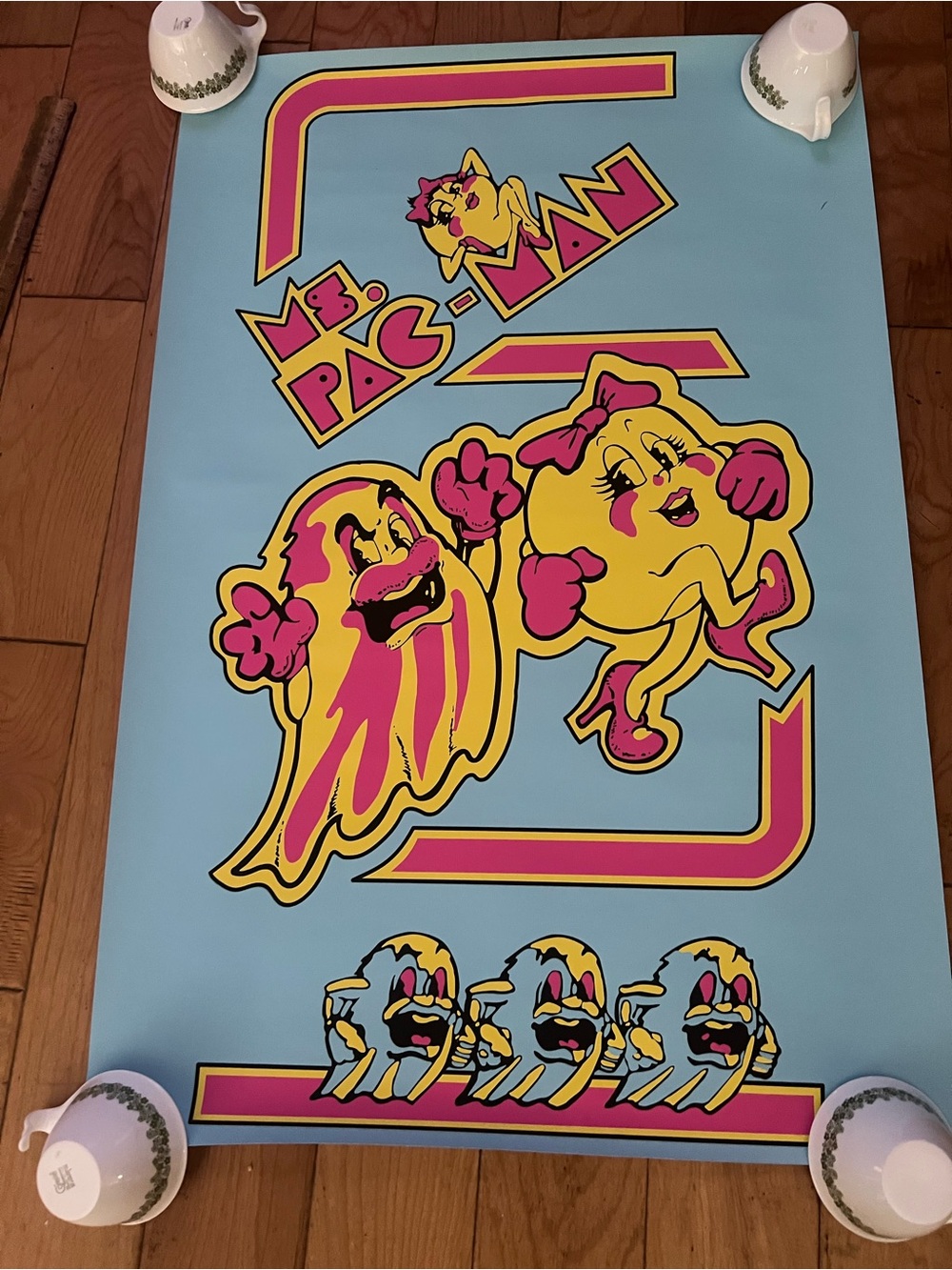 Pac-Man Inspired Blue Retro Wall Poster with Yellow and Pink Characters